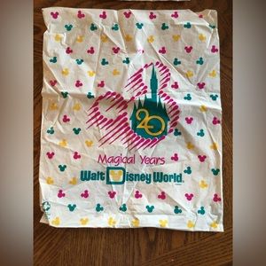 4 assorted size plastic Disney 20th year bags